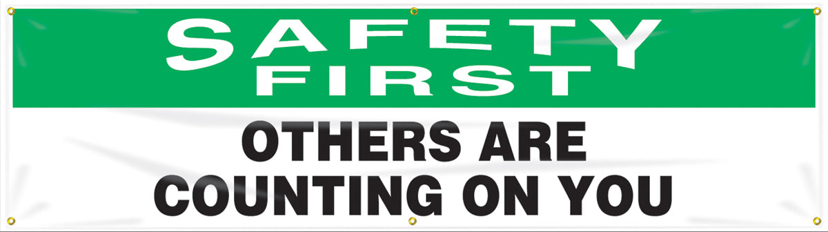 Accuform® 4" X 96" Green, Black And White Reinforced Flexible Poly Sheeting Safety Banners & Posters "SAFETY FIRST OTHER ARE COUNTING ON YOU"